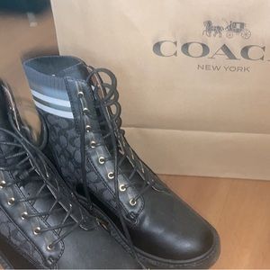 I am selling a size 7 pair of almost new Coach boots.